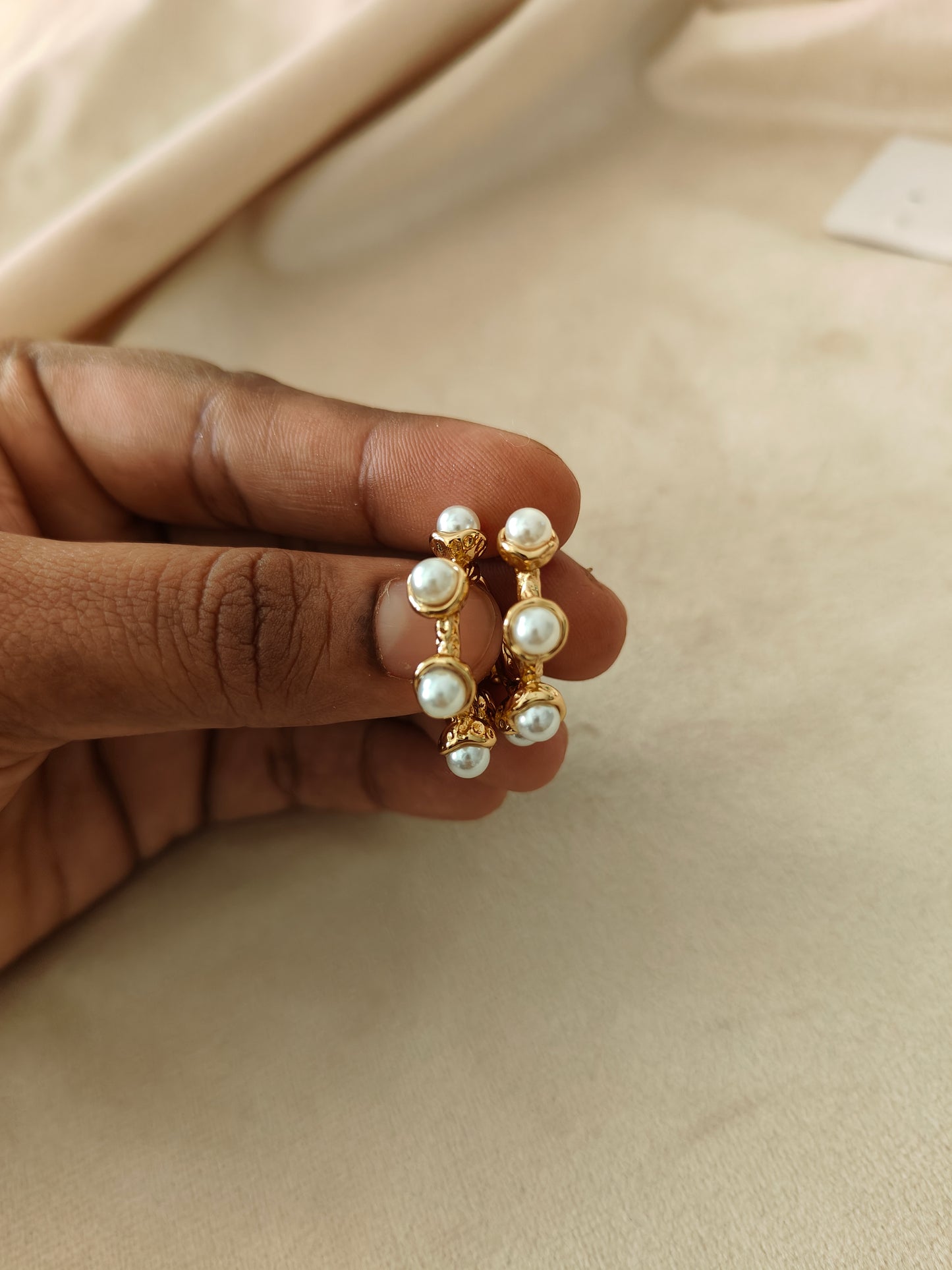 Pearl studded moon hoop